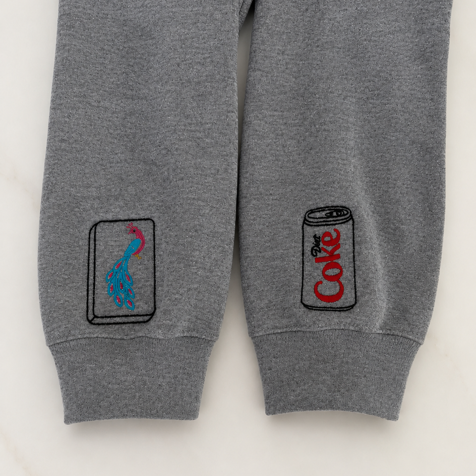 Sleeve print detail on the Diet Coke & Mahjong sweatshirt